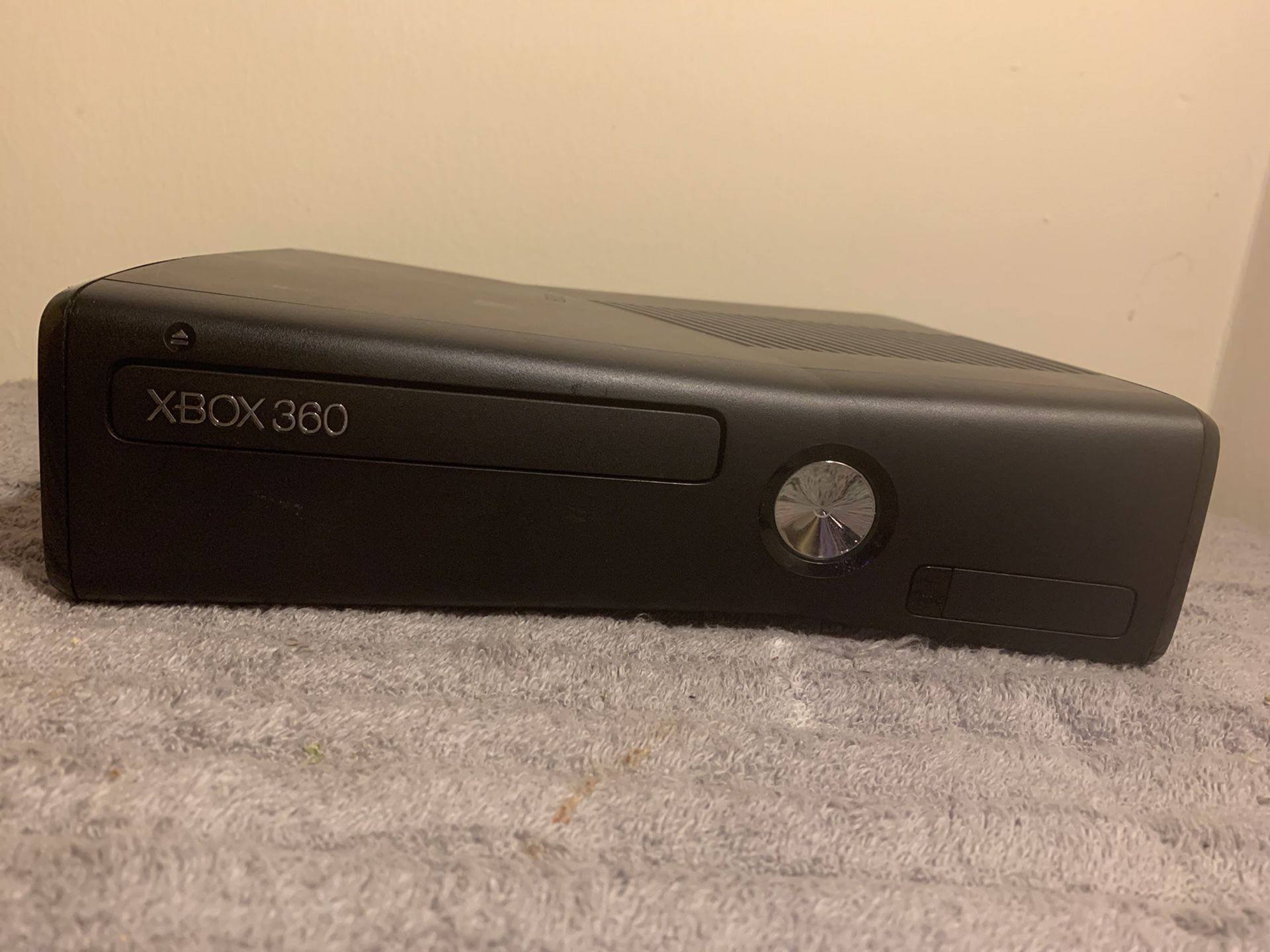 Xbox 360 with controllers and headset