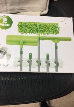 Broom and mop organizer