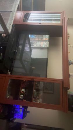 Big wooden entertainment cabinets, good condition. 3 piece.