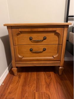 Two matching wooden night stands