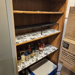 Very sturdy, real wood 4 tiered adjustable shelf. 