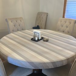 60” round dining table + 6 chairs