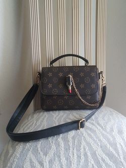 Black and brown Louis Vuitton replica leather wallet