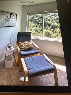 IKEA POÄNG Armchair with Ottoman.