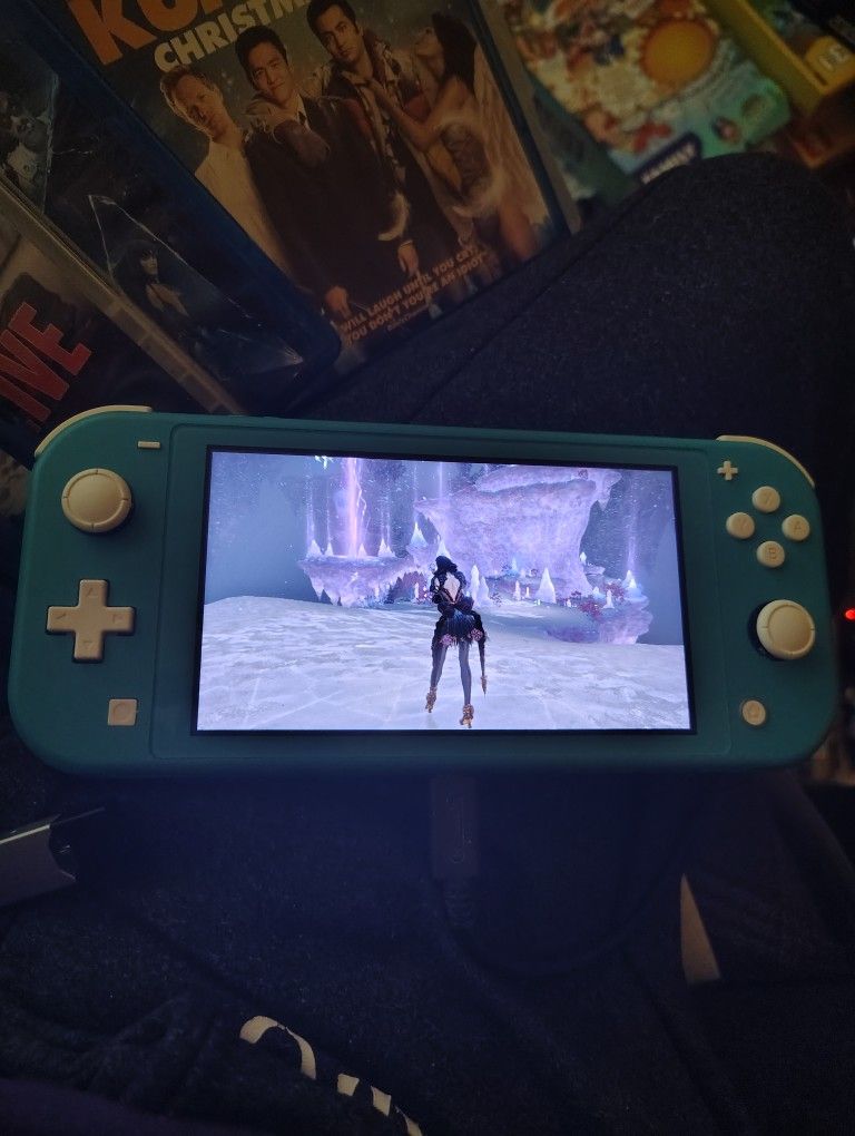 Nintendo Switch Lite With 8 Games