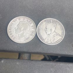 Two Natural Toned Canadian Half Dollar Coins (makeAoffer)
