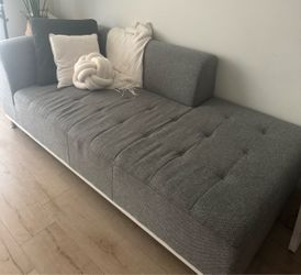 Gray Fabric Sofa with White Base