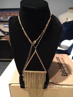 Gold tone tassel necklace