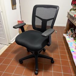 Black office hair w/ mesh back and adjustable armrests