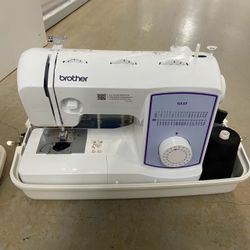 Open to offers! SEWING MACHINE + SURGE + TONS OF THREADS
