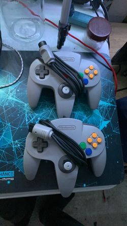 2 Nintendo 64 controllers
