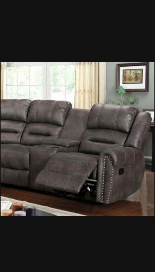 Kenedy Brown reclining Sectional Sofa