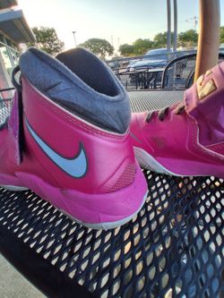 pink Nike LeBron Zoom Soldier 7 'Kay Yow' sneakers, featuring the signature "LEBRON JAMES