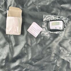 digital pedometer, a portable device used to count steps and track physical activity. 