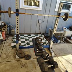 Bench Press W Olympic Bar And Some Weights 