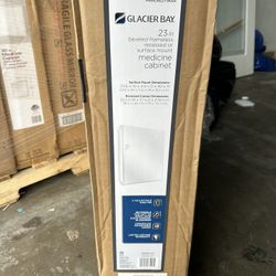 Glacier Bay 23.6 in. W x 30 in. H Rectangular Wood Composite Medicine Cabinet with Mirror