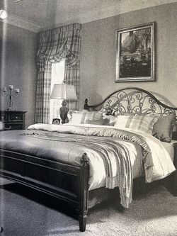 King headboard and footboard bedframe all included. Solid wood with metal.