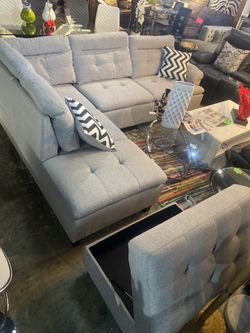 Grey Fabric Sectional with storage Ottoman