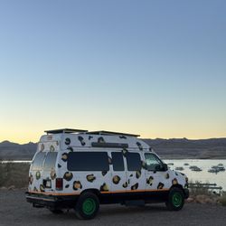 2011 Ford E150 High‑Roof Camper Van | Solar, Bed, Tow Hitch, Ready for Adventure