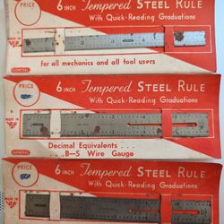 General 6" Tempered Steel Rule No. 304  With Quick Reading Graduations. Bottom 2 No. 310 Have Decimal Equivalents B&S Wire Gauge. Made In USA. Surface