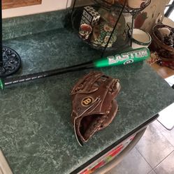 Baseball equipment including 13” Wilson A2914 glove, Easton 28” 20:ounce bat and 2 baseballs
