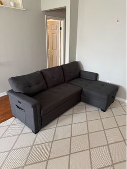 Convertible Sectional Sofa with Pull-Out Bed & Storage