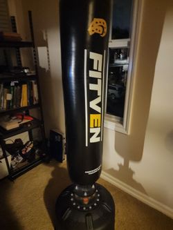 Punching bag +  2x gloves, wraps, pads