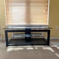 For Sale: Sleek Modern Black Glass TV Stand – Excellent Condition!