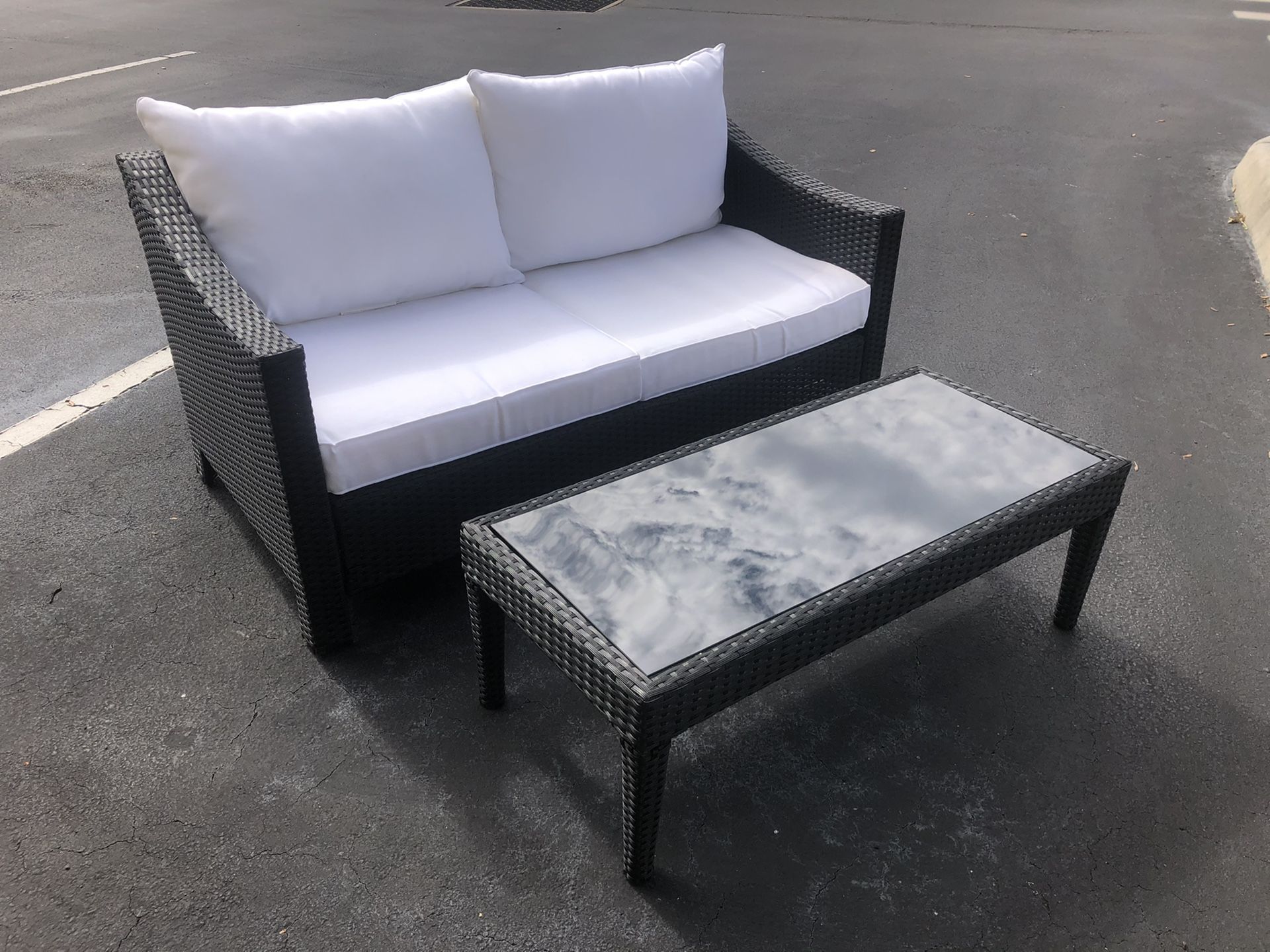 Beautiful black and white weather-proof resin loveseat patio set