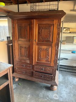 Antique Wood Armoire with Carved Details