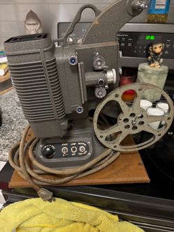 Dejur 8mm movie projector