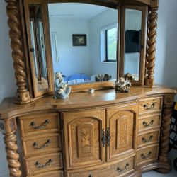 Michael Amini dresser with a storage mirror, often part of the AICO (Amini Innovation Corp) collections.