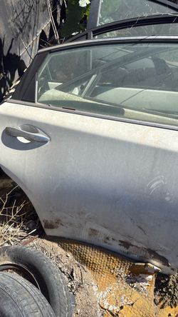 Altima passenger rear door complete