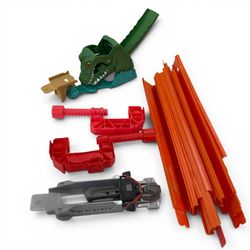 Hot Wheels Trick Tracks Dinosaur Jaw Drop Playset Mattel 2010 LOT OF 16 T7498  The Hot Wheels Trick Tracks Dinosaur Jaw Drop Playset is a plastic toy 