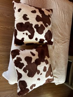 2 COW PRINT THROW PILLOWS