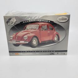 Testor #440072 Metal Body Silver Series Volkswagen Beetle 1/24 Model Kit 
New, sealed. Weight of the package 15oz plus shipping materials.
UPC 0756114