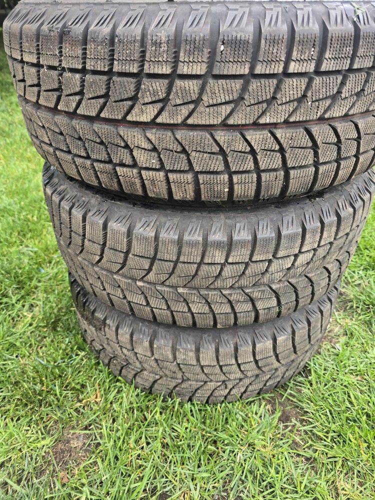 Bridgestone Blizzak WS60 215/60/R15 94R 3tires W/rims