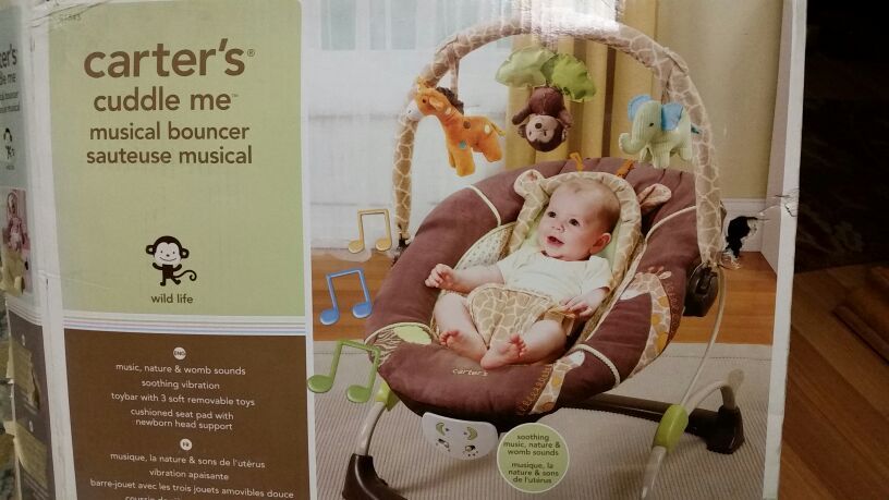 Carter's cuddle me musical bouncer / $60 value / music nature womb sounds / soothing vabration / wild life theme