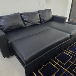 🛋️ Modern Black Sleeper Sectional Sofa – Pull-Out Bed + Storage!
