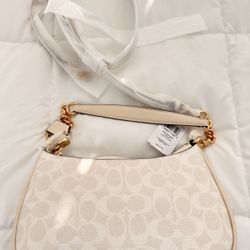 UGG Black Tasman slippers with Coach Teri shoulder bag. 2 for 1 deal.