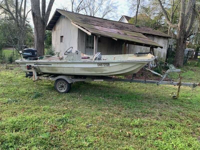 1976 Fiberglass 14 ' Boat with trailer and outboard motor
