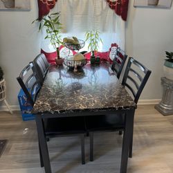 Table with 3 chairs for sale $90 or best offer 