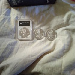 Three  1 Oz Silver Dollars