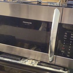 STAINLESS STEEL MICROWAVE OVER THE RANGE....USED...$ 150