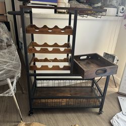 Like new moving must sell today wine cart w/tray $60 mar offer
