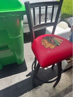 Pair if chicago blackhawk bar stools