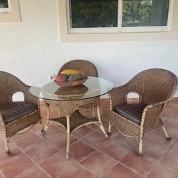 Patio table with chairs and centerpiece