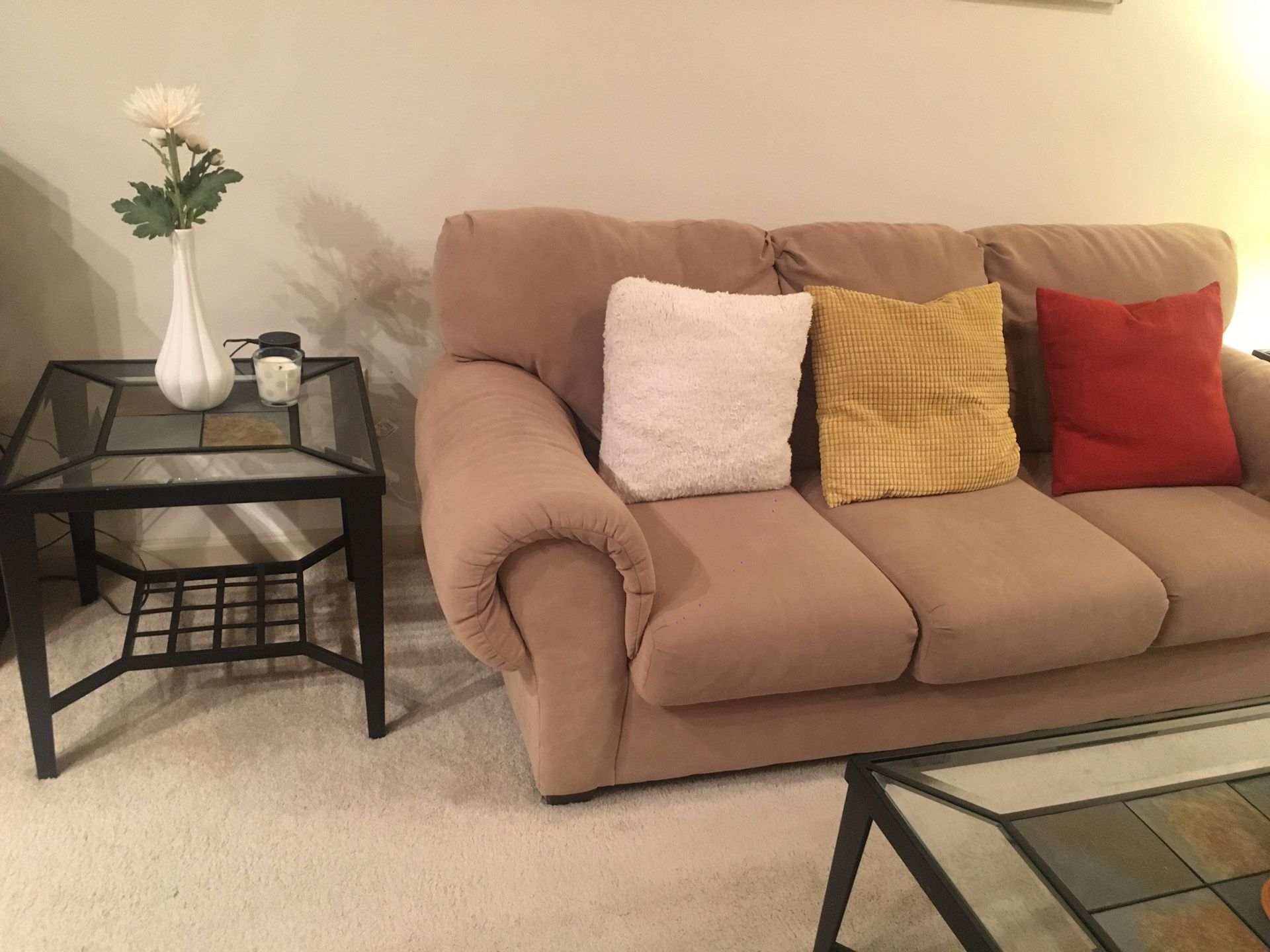Tan couch and matching loveseat