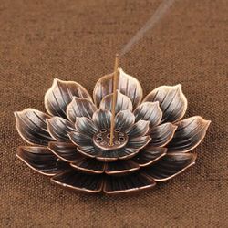 Lotus incense burner: decorative metal design.