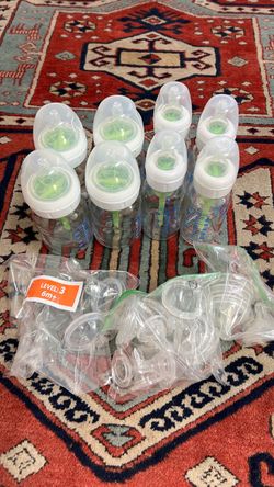 Dr. Brown anti-colic glass bottles, 8 total, extra nipples different sizes